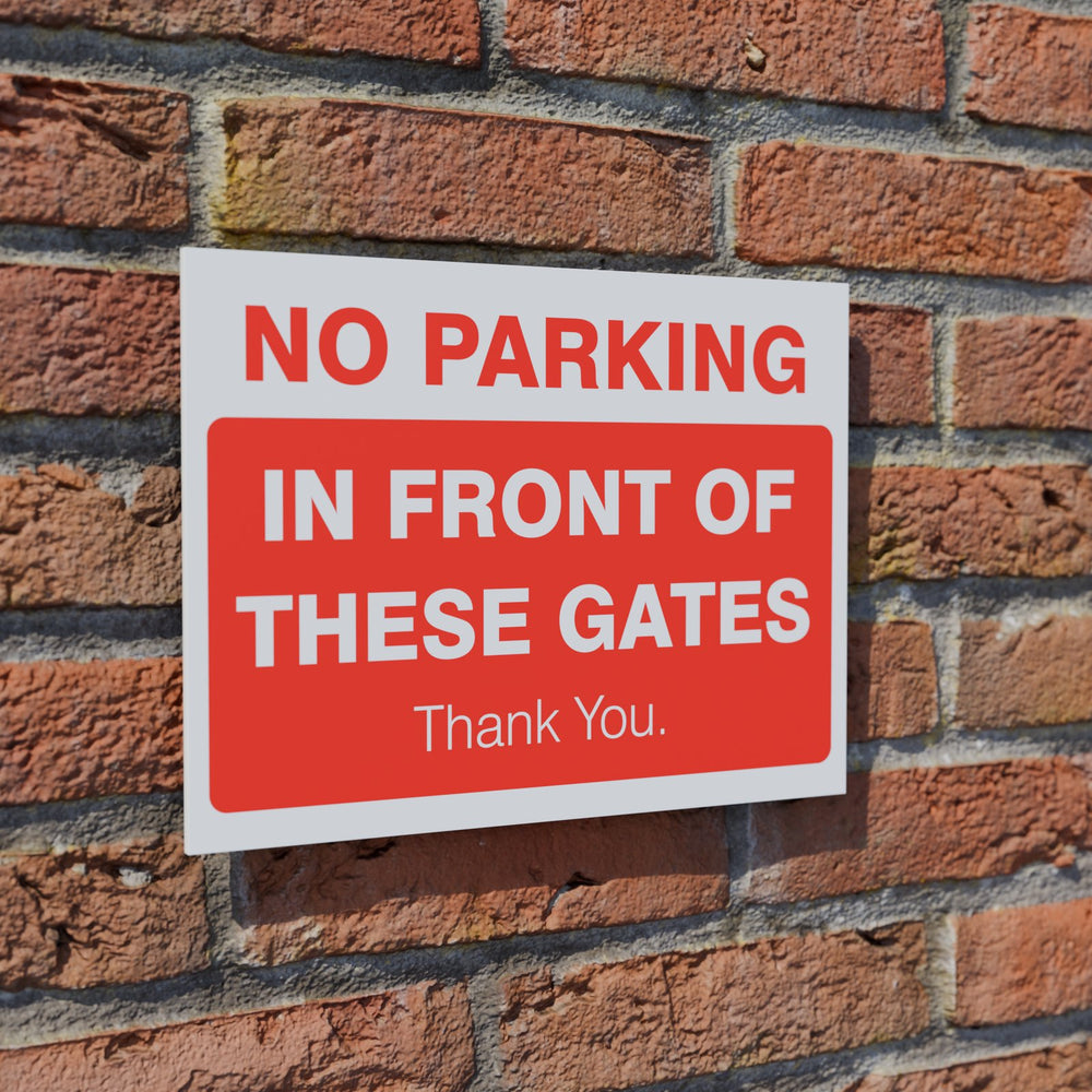 No Parking In Front of These Gates safety sign