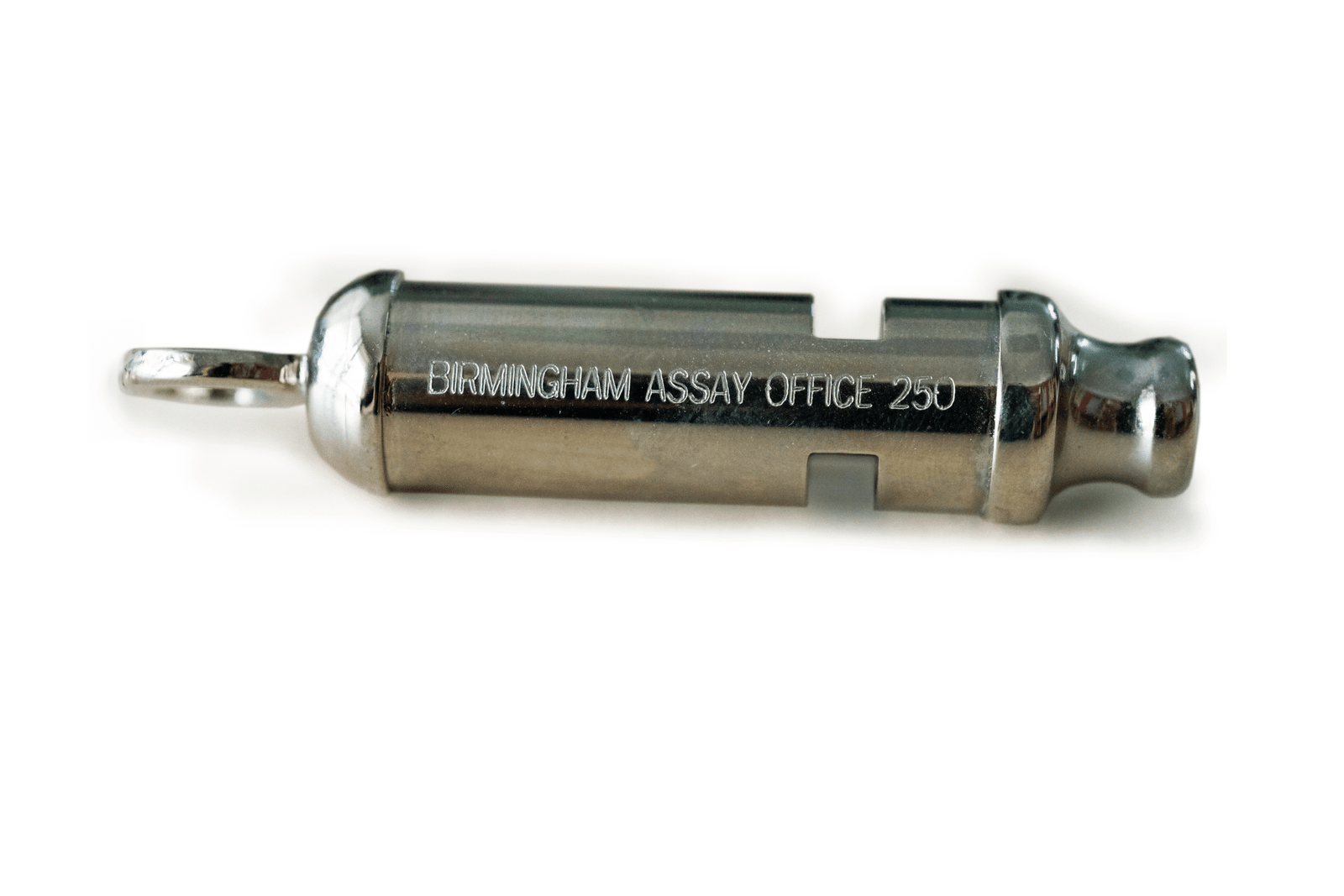 Close-up of a silver-toned metal whistle with 'BIRMINGHAM ASSAY OFFICE 250' engraved on its side, on a white background.
